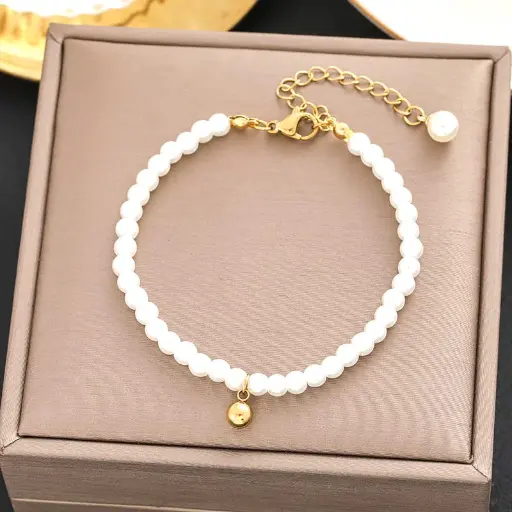 Pulsera perlas y corazón